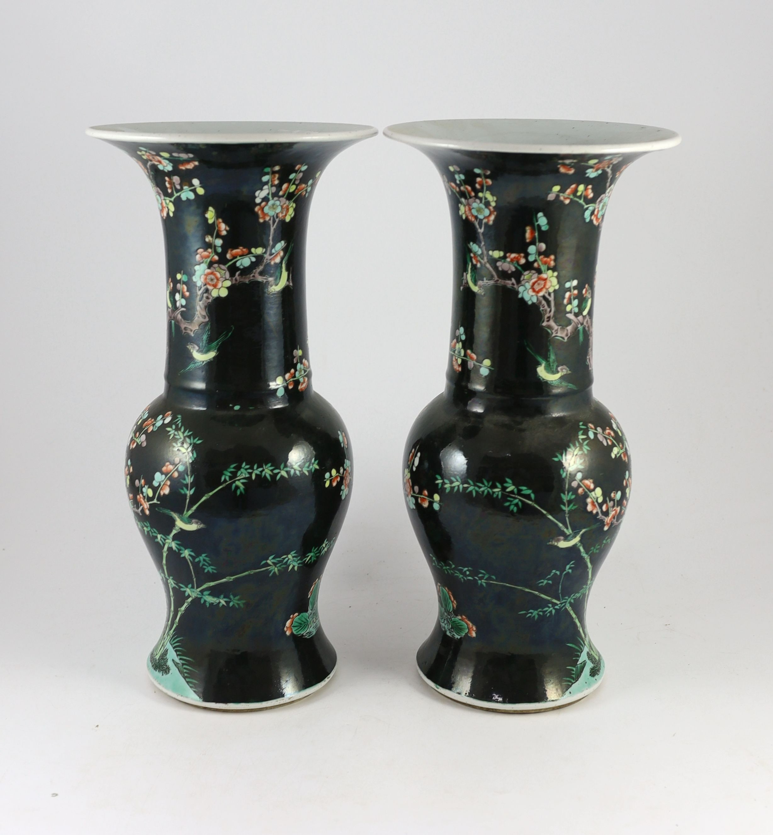 A pair of large Chinese famille noire yen-yen vases, six character Kangxi marks but 19th century, 44 cm high